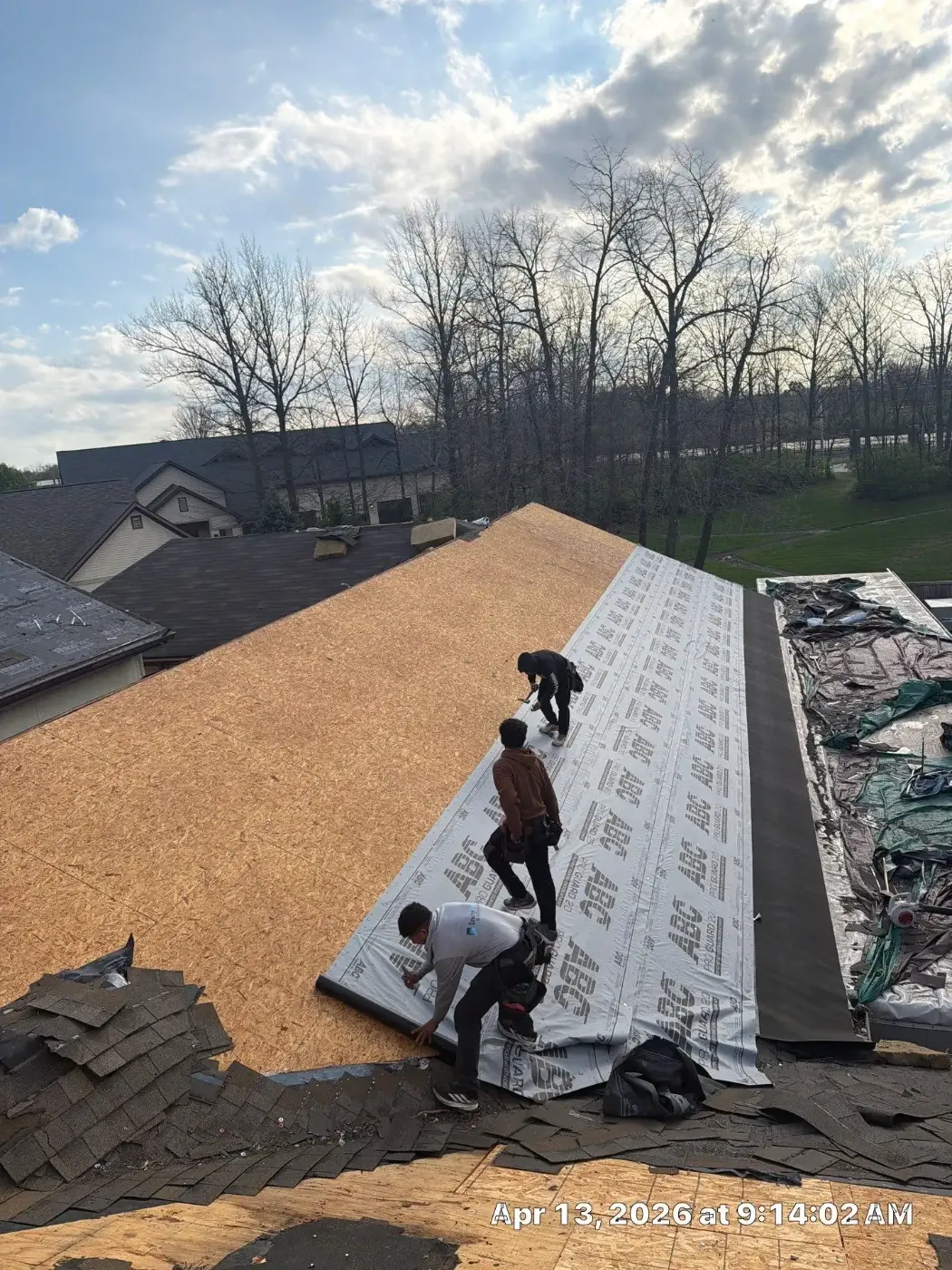 Tarping and dry-in on a Cedar Lake commercial roof